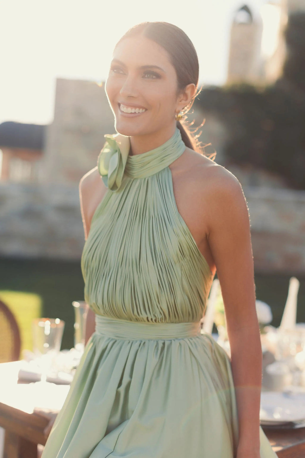 Green Halter Neck Open Back Satin Gown With Slit